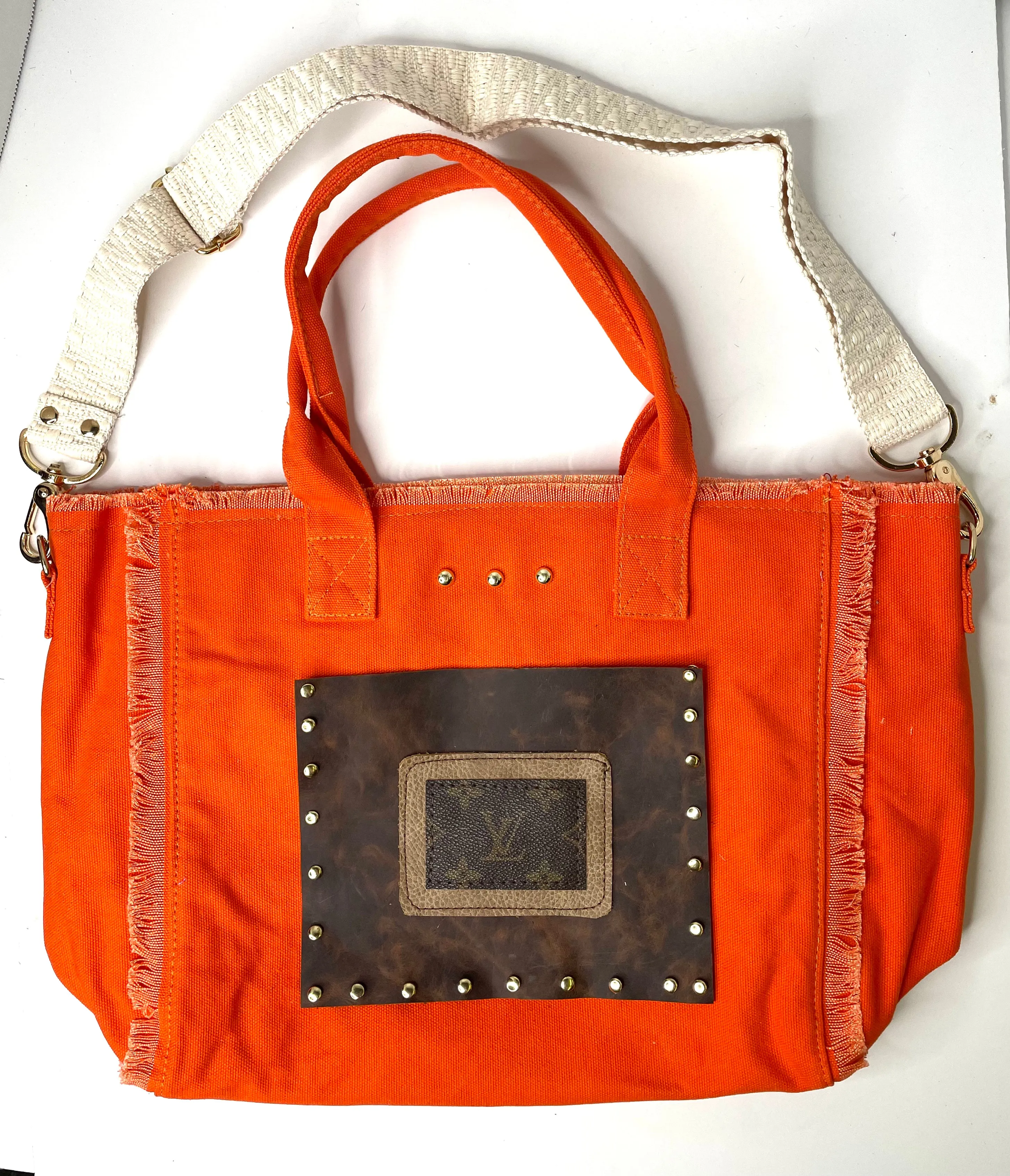 Frayed Edge Tote/Crossbody in orange zipper closure